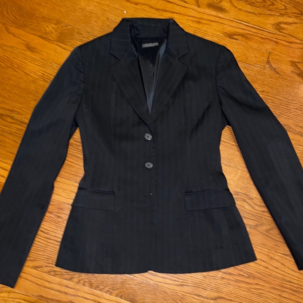 Black pinstriped suit jacket